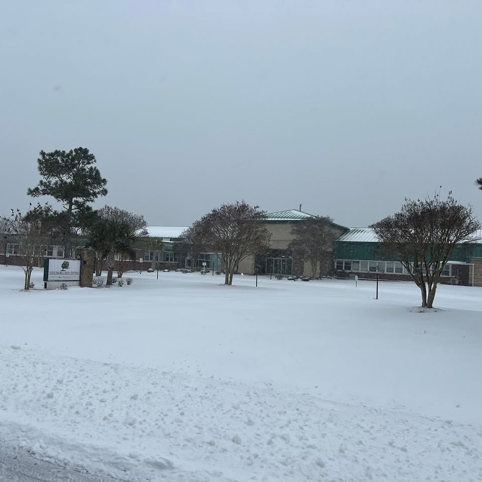 Carolina Wellness Centers hospital exterior and campus grounds after snowfall